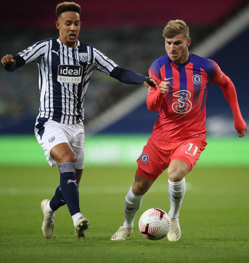 West Brom's Callum Robinson, left, vies with Chelsea's Timo Werner. AFP