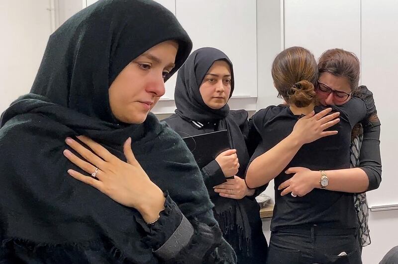 Mourners attend a vigil at the University of Toronto for the victims of a Ukrainian passenger jet which crashed in Iran.  Reuters