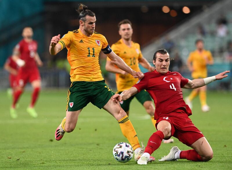 Wales forward Gareth Bale is tackled by Turkey defender Caglar Soyuncu. AFP