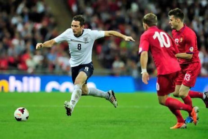Frank Lampard himself did not expect to last longer than 20 caps for England but he has grown in his role in the midfield even as age is catching up on him. Glyn Kirk / AFP