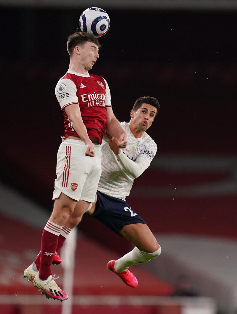 Arsenal's Kieran Tierney wins a header. Getty