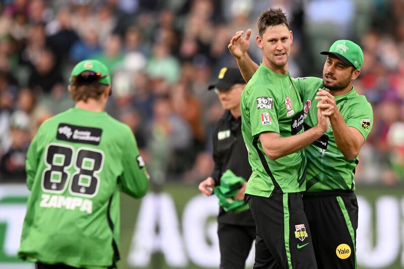 Adam Zampa, Marcus Stoinis and Beau Webster of Melbourne Stars celebrate the wicket of Martin Guptill of Melbourne Renegades. Getty 