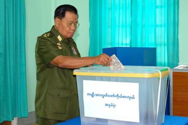 epa02436085 A picture made available on 08 November 2010 shows Myanmar junta chief Senior General Than Shwe casting his ballot at the polling station in Naypyitaw, Myanmar, 07 November 2010. Myanmar's military-ruled population voted on 07 November in the first election in more than 20 years, designed to introduce 'discipline-flourishing democracy.'  EPA/MYANMAR NEWS AGENCY HANDOUT EDITORIAL USE ONLY