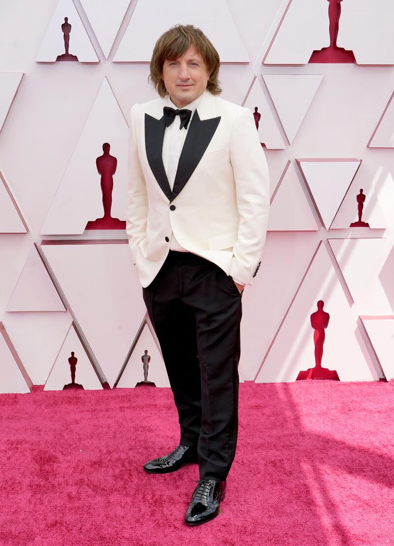Daniel Pemberton arrives at the 93rd Academy Awards at Union Station in Los Angeles, California, on April 25, 2021. AP