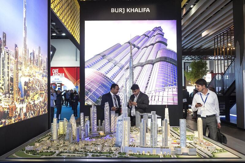 Above, Emaar's Downtown Dubai scheme being showcased at Cityscape Global. Antonie Robertson / The National