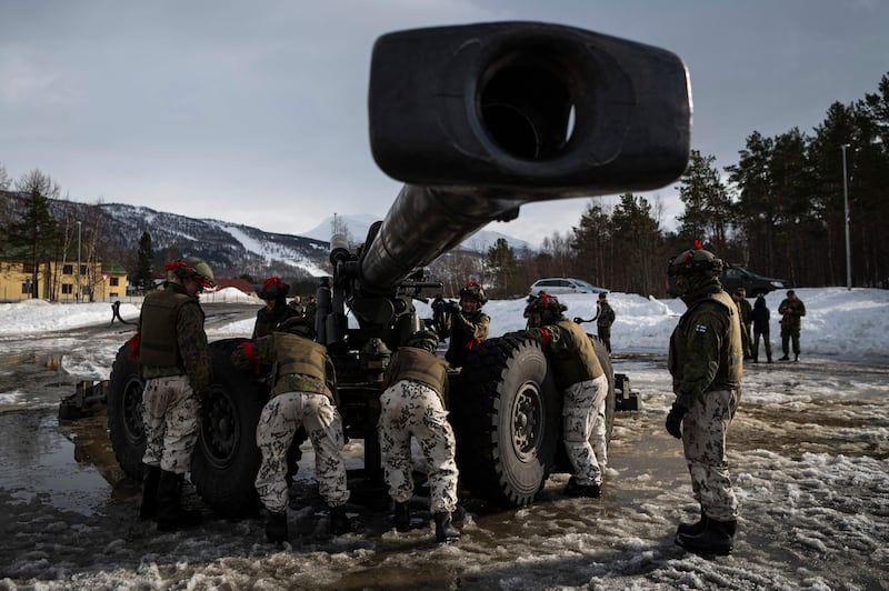 Soldiers from the Finnish Defence Forces operate the Tampella, a towed field gun, as they participate in the international military exercise in Norway. AFP