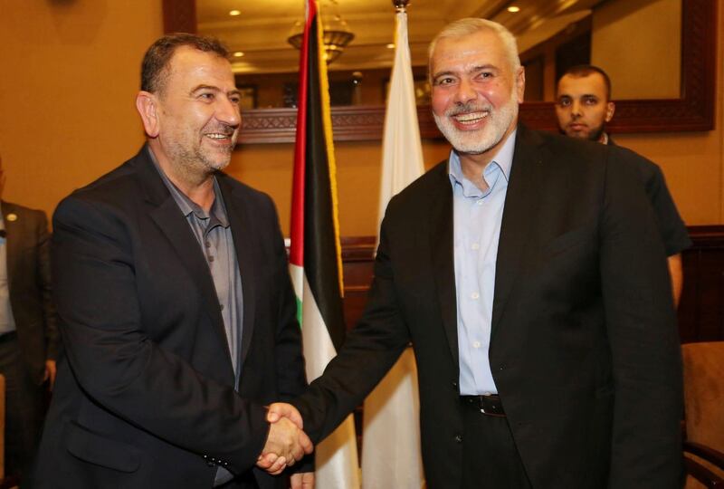 Hamas Chief Ismail Haniyeh shakes hands with Hamas Deputy Chief Saleh al-Arouri, in Gaza City August 2, 2018. Hamas Chief Media Office/Handout via REUTERS ATTENTION EDITORS - THIS PICTURE WAS PROVIDED BY A THIRD PARTY. NO RESALES. NO ARCHIVE