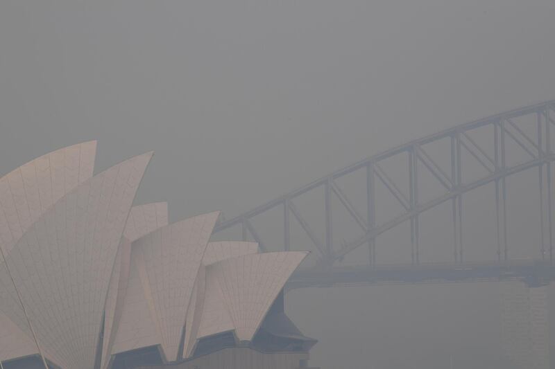 Thick smoke hangs in the sky in Sydney. EPA