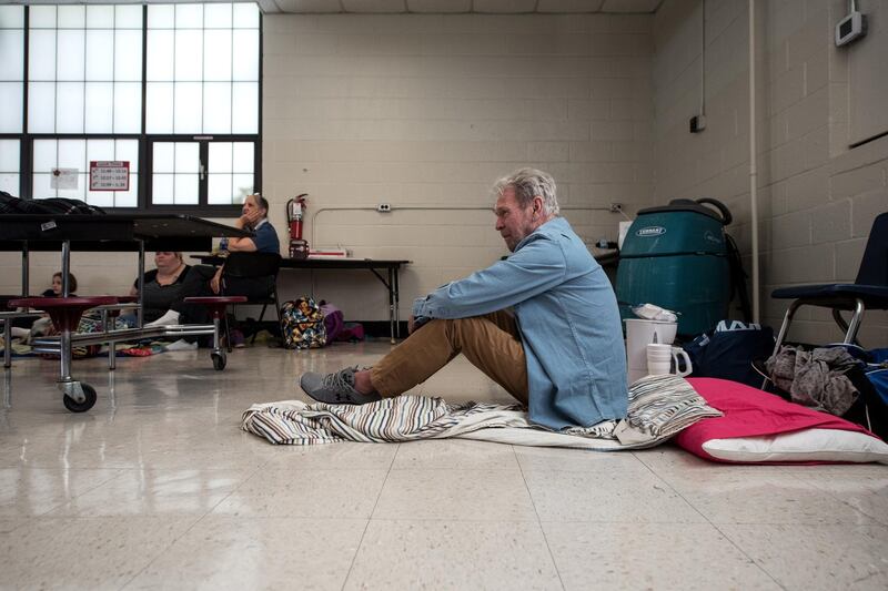 Patrick Russell sits in Burgaw Middle School as he seeks shelter ahead of the forecasted landfall of Hurricane Florence in North Carolina. EPA