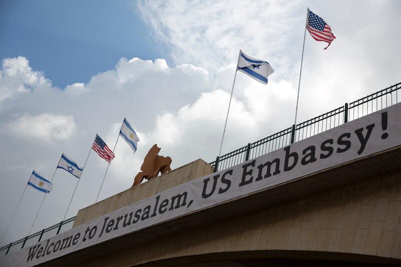 A sign on a bridge leading to the US Embassy compound ahead the official opening in Jerusalem, on May 13, 2018. Ariel Schalit / AP Photo