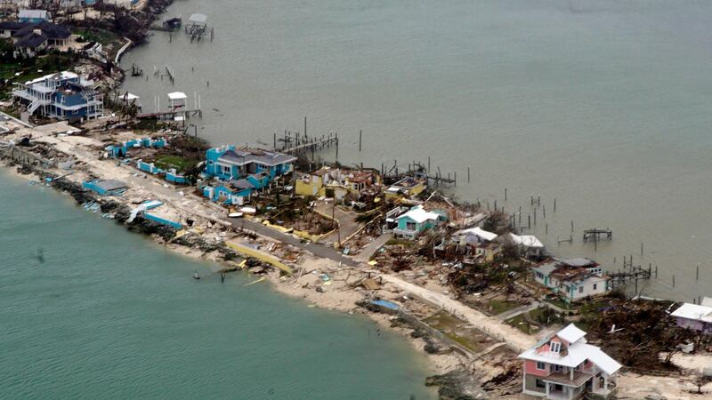 A handout photo made available by the US Coast Guard shows an aerial view of a row of damaged structures in the Bahamas, seen from a Coast Guard Elizabeth City C-130 aircraft after Hurricane Dorian shifted north.  EPA