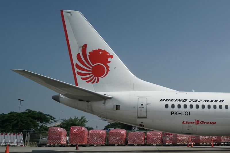 Aircraft stabilizers, left, sit on a grounded Lion Air Boeing Co. 737 Max 8 aircraft at Terminal One of Soekarno-Hatta International Airport in Cenkareng, Indonesia, on Tuesday, March 15, 2019. Sunday’s loss of an Ethiopian Airlines Boeing 737, in which 157 people died, bore similarities to the Oct. 29 crash of another Boeing 737 Max plane, operated by Indonesia’s Lion Air, stoking concern that a feature meant to make the upgraded Max safer than earlier planes has actually made it harder to fly. Photographer: Dimas Ardian/Bloomberg