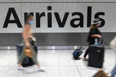 A man and a woman have been fined £10,000 each after failing to go to hotel quarantine after returning from Dubai. AFP