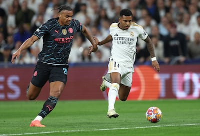 Manchester City's Manuel Akanji tracks Real Madrid forward Rodrygo during Tuesday's 3-3 Champions League quarter-final first leg. Getty