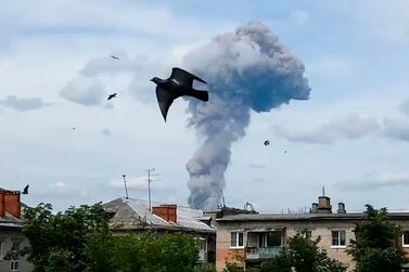 Smoke rises after an explosion in a plant manufacturing TNT explosive in Dzerzhinsk. AP