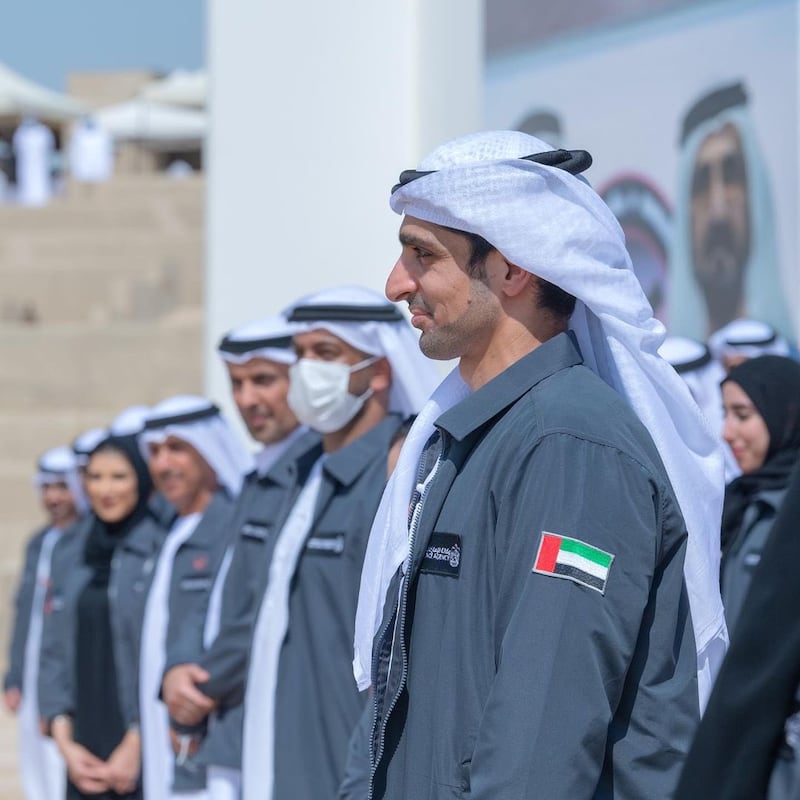 Omran Sharaf, project manager of the UAE Mars Mission, stands among his team as they are honoured by the country's leaders for successfully sending the Hope Probe to the Red Planet. Sheikh Mohammed bin Rashid and Sheikh Mohamed bin Zayed stand for a photo with the UAE Mars Mission team at Bab Al Shams arena in Dubai. Courtesy: Sheikh Hamdan bin Mohammed Twitter