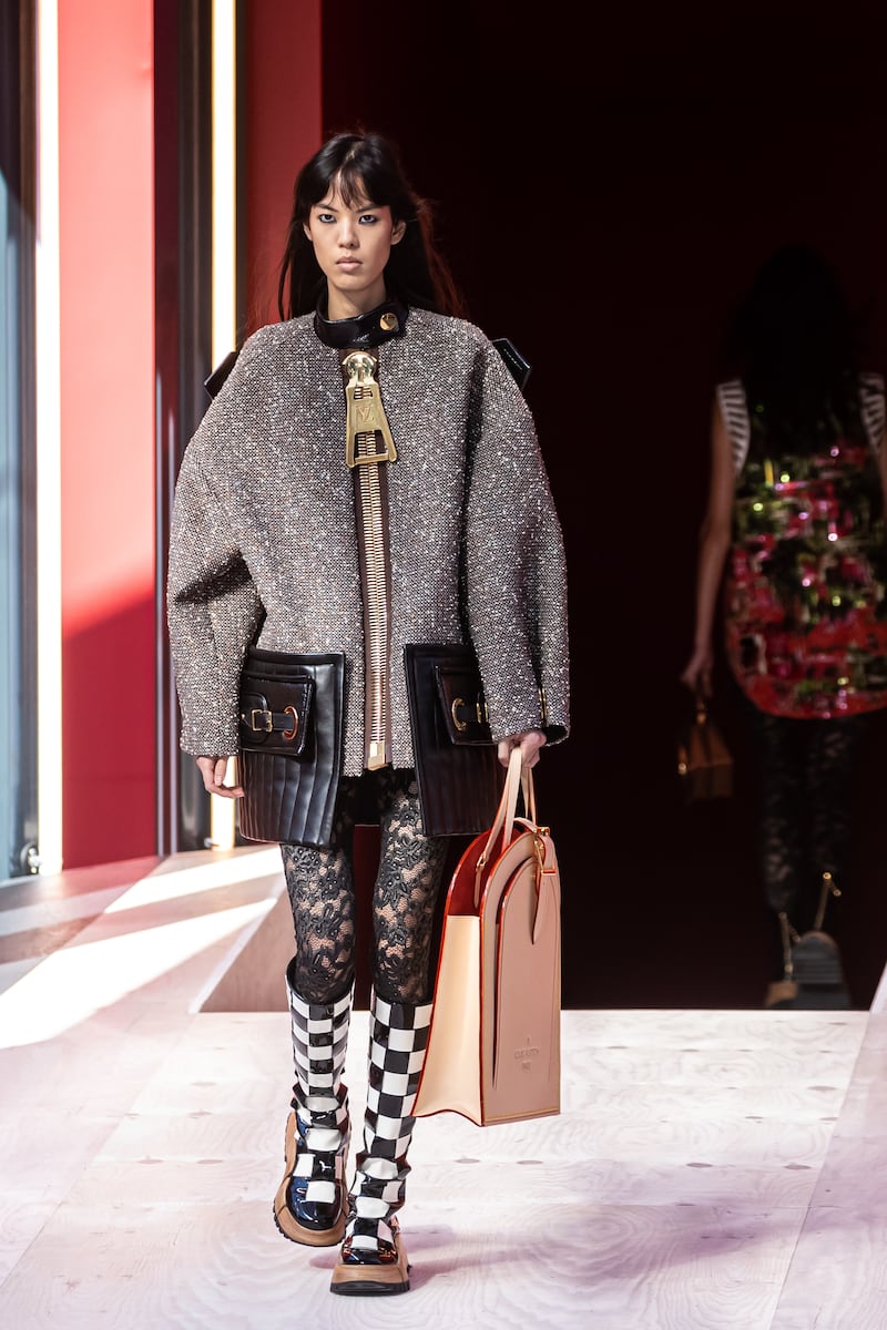 A look from the Louis Vuitton spring/summer 2023 ready to wear collection by French designer Nicolas Ghesquiere features an oversized zip. EPA 