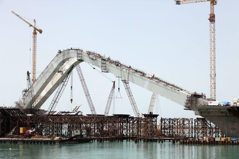 A construction firm estimates the Sheikh Zayed Bridge could be open in October. Courtesy Jaime Puebla / The National