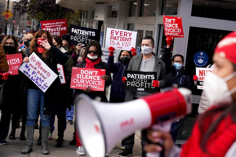 Nurses and their supporters rally in front of Montefiore Medical Center in the Bronx borough of New York. The nurses were demonstrating to bring attention to the the lack of preparedness for a coronavirus second wave. AP