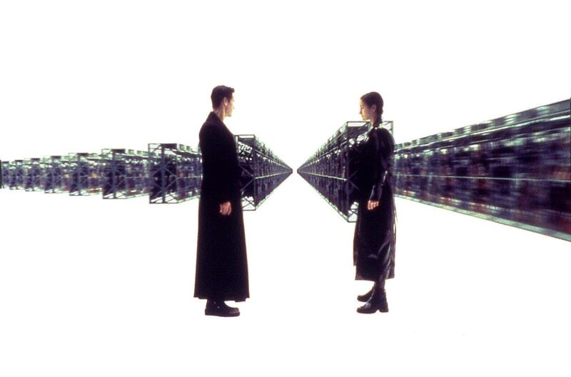 Keanu Reeves and Carrie Ann-Moss in The Matrix. Courtesy Warner Bros.