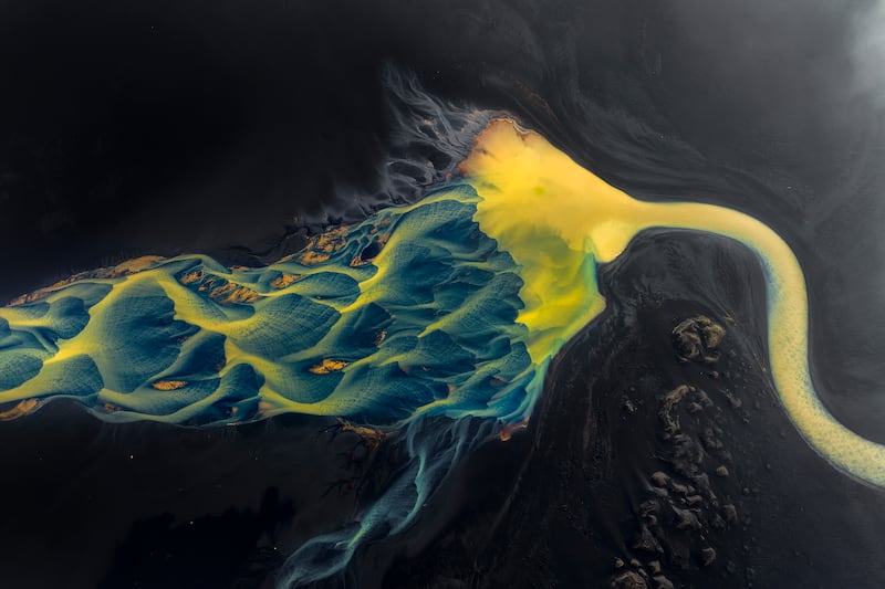 Gold award winner in the Nature Art category: Blue watery veins, glacial braids and golden sediment in Iceland, taken by Miki Spitzer