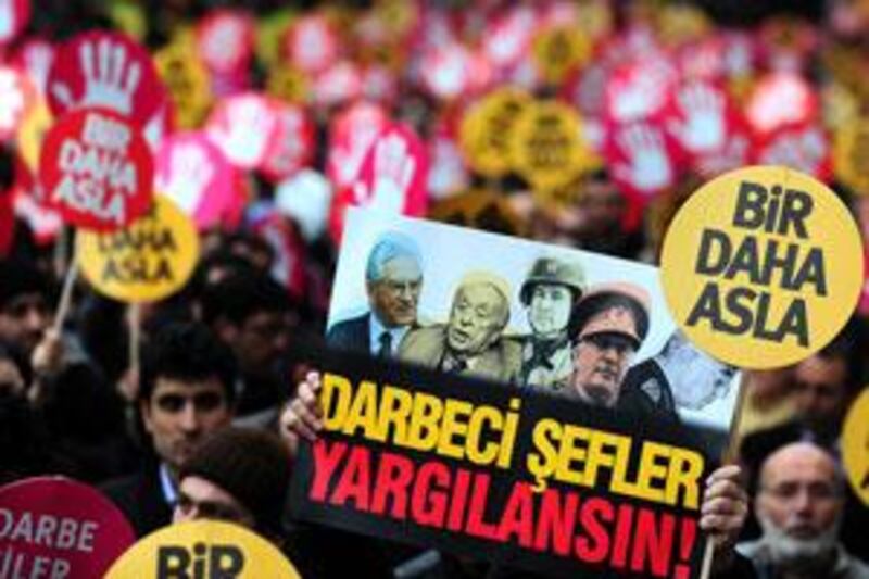 Demonstrators march in Istanbul against the suspected coup. But some see the arrests as a plot by elements within the government to discredit the country's secular armed forces.