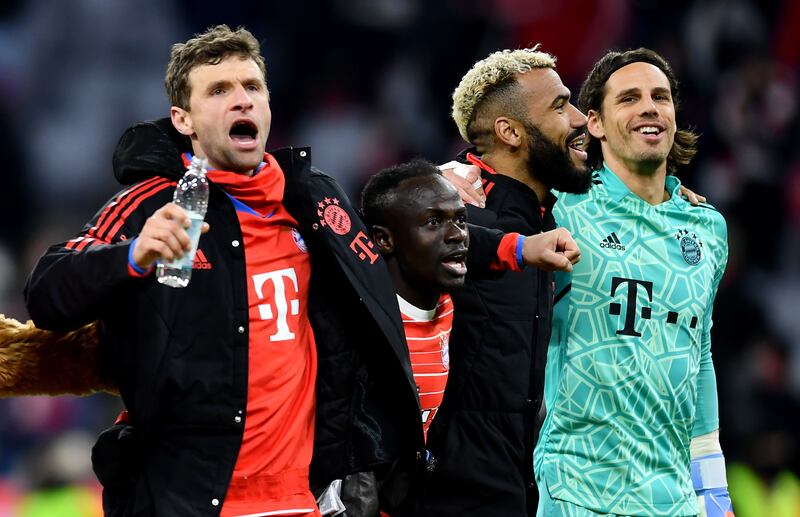 Thomas Muller, left, celebrates with teammates after the match. EPA