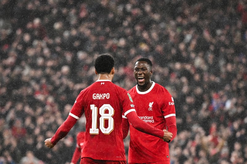 Liverpool's Cody Gakpo celebrates his goal with teammate Ibrahima Konate. AFP  
