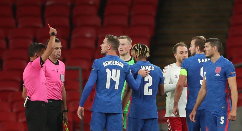 Referee Jesus Gil Manzano shows England's Reece James (C) a red card after the final whistle. AFP