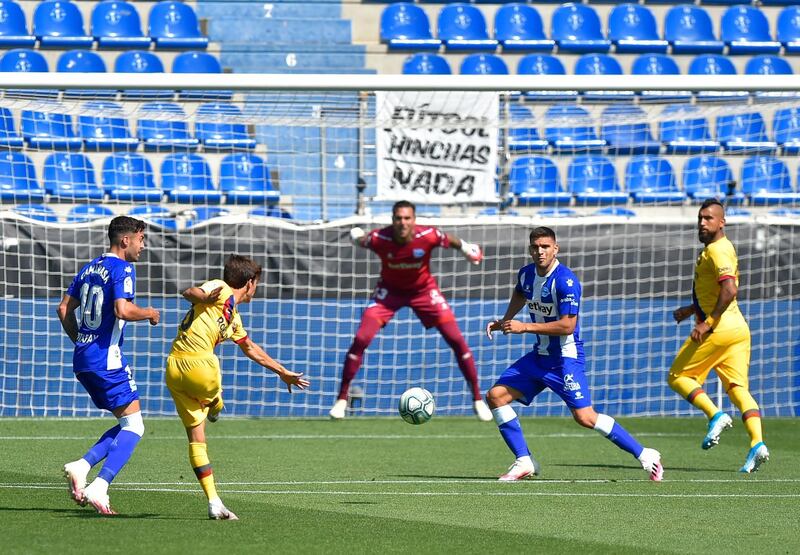 Barcelona midfielder Riqui Puig  takes a shot at goal. AFP