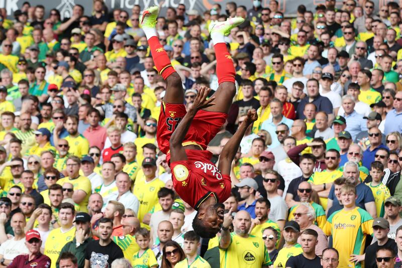 Watford's Emmanuel Dennis celebrates scoring against Norwich City in the Premier League match at Carrow Road on Saturday, September 19. Reuters