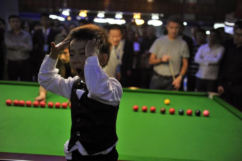 Looks like Wuka is playing against Hendry well past his bedtime. A thorough professional. Reuters