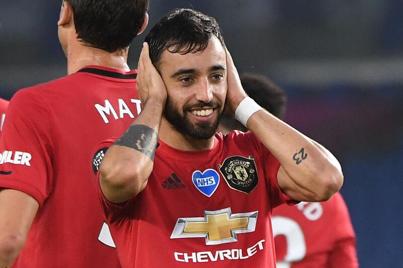 Manchester United midfielder Bruno Fernandes celebrates scoring the second goal during the Premier League football match at Brighton. AFP