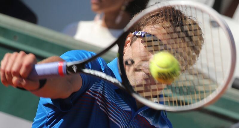 Spain's Tommy Robredo returns against compatriot david Ferrer in their quarterfinal match at the French Open tennis tournament, at Roland Garros stadium in Paris, Tuesday June 4, 2013. Ferrer won in three sets 6-2, 6-1, 6-1. (AP Photo/Michel Euler) *** Local Caption ***  France Tennis French Open.JPEG-04723.jpg