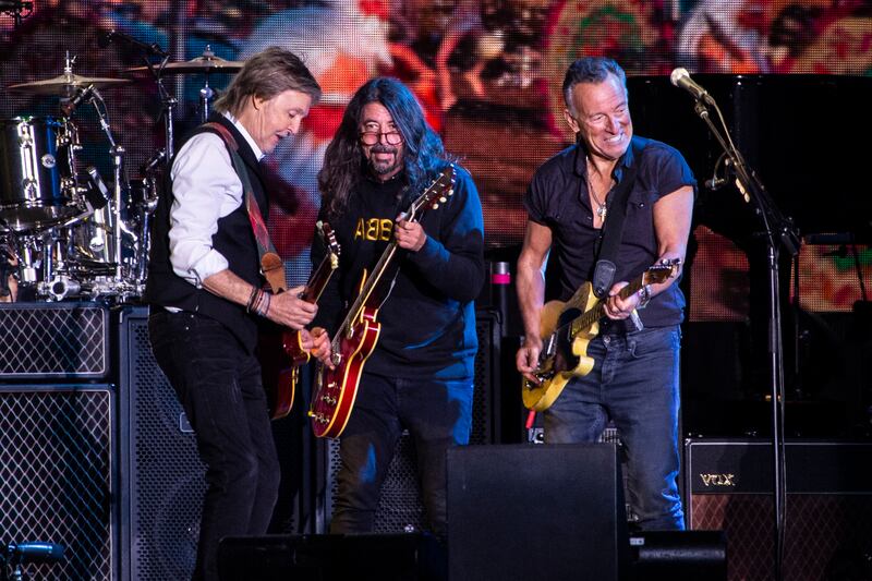 Sir Paul McCartney invited Dave Grohl and Bruce Springsteen on stage to perform with him in the former Beatle's Glastonbury headline set on Saturday night. AP Photo