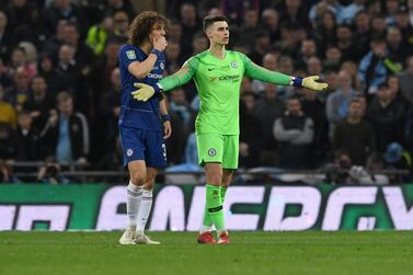 Chelsea's goalkeeper Kepa Arrizabalaga, right, refused to be substituted during the League Cup final against Chelsea. EPA