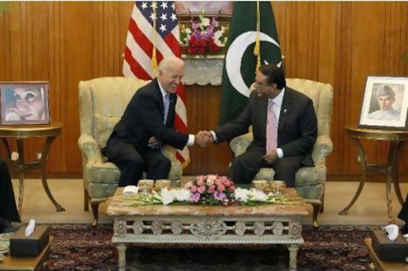 The US vice president, Joe Biden, left, with the Pakistani president, Asif Ali Zardari, in Islamabad yesterday.