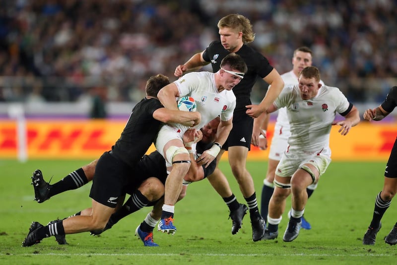 YOKOHAMA, JAPAN - OCTOBER 26:  Tom Curry of England tries to break through the New Zealand defence during the Rugby World Cup 2019 Semi-Final match between England and New Zealand at International Stadium Yokohama on October 26, 2019 in Yokohama, Kanagawa, Japan. (Photo by Shaun Botterill/Getty Images)