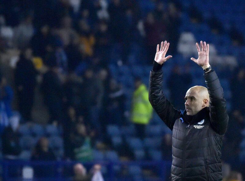 Manchester City manager Pep Guardiola celebrates after the match. AP