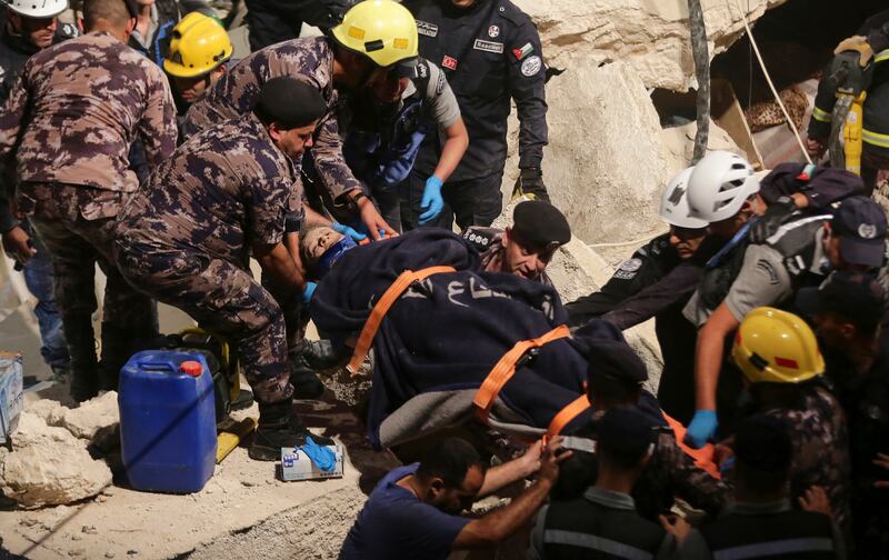 Jordanian authorities say 14 people died and 10 were injured when a residential building collapsed in Amman. AP