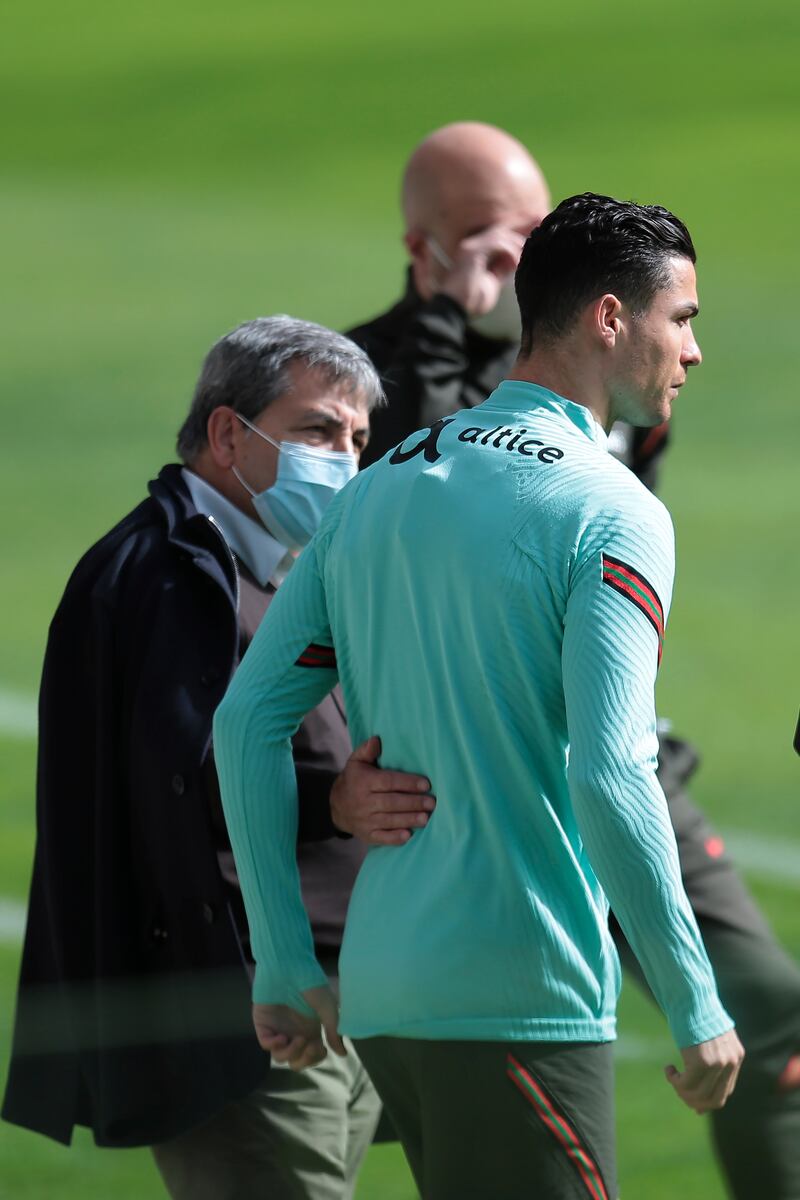 Cristiano Ronaldo with FPFA chairman Fernando Gomes during training. EPA