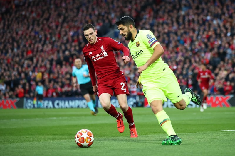 LIVERPOOL, ENGLAND - MAY 07:  Luis Suarez of Barcelona battles for possession with Andy Robertson of Liverpool during the UEFA Champions League Semi Final second leg match between Liverpool and Barcelona at Anfield on May 07, 2019 in Liverpool, England. (Photo by Clive Brunskill/Getty Images)