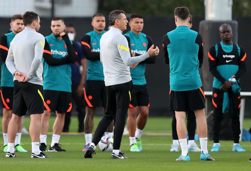 Chelsea assistant coach Arno Michels talks to the squad at training.