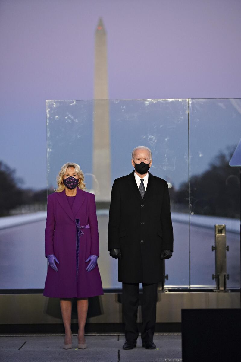 US President Joe Biden and First Lady Dr Jill Biden, in Jonathan Cohen, attend a Covid-19 memorial to lives lost in Washington on January 19. Bloomberg