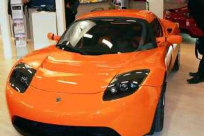 View of the Tesla Roadster electric from Tesla Motors during the second press day of the Paris Auto Show, Friday, Oct. 3, 2008. The show runs for the public through Oct. 4 - 19. (AP Photo/Remy de la Mauviniere)