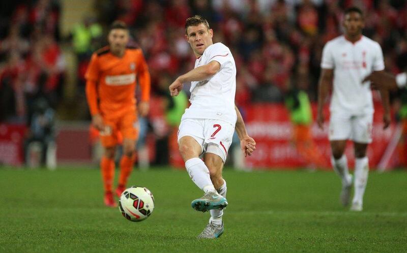 James Milner plays the ball against Brisbane Roar during Liverpool's international friendly on Friday in Australa, part of their Asian tour. Jason O'Brien / Action Images / Reuters