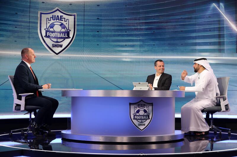 Graham Clews, Pedro Correia, and Abdullah Al Saadi during the recording of The UAE Football Show. Pawan Singh / The National 