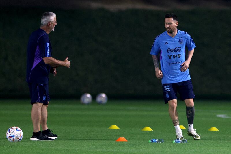  Lionel Messi is watched by the Argentina medical team. Getty