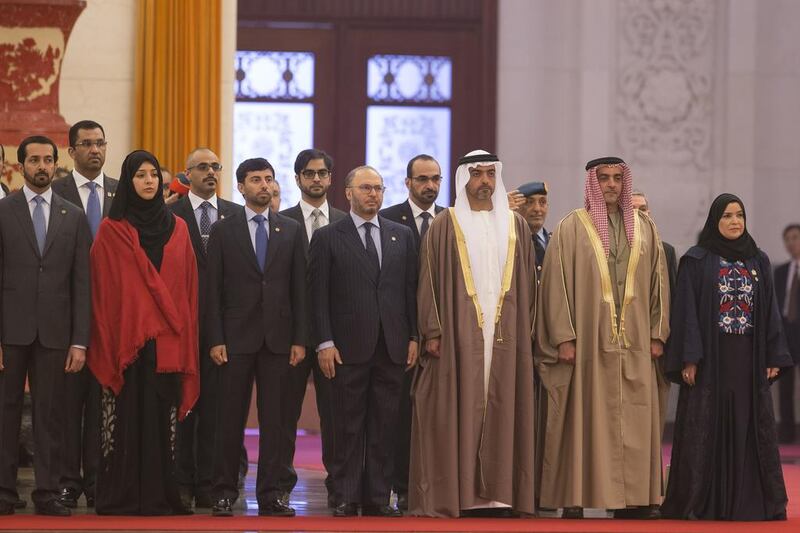 (Front row R-L) Dr Amal Al Qubaisi, Speaker of the Federal National Council (FNC), Lt Gen Sheikh Saif bin Zayed, Deputy Prime Minister and Minister of Interior, Sheikh Hamed bin Zayed, Chairman of Crown Prince Court - Abu Dhabi and Managing Director of the Abu Dhabi Investment Authority (ADIA), Dr Anwar Gargash, Minister of State for Foreign Affairs, Suhail Al Mazrouei, Minister of Energy, Reem Al Hashimi, Minister of State, Mubarak Al Mansoori, Governor of the UAE Central Bank, attend a reception held at the Great Hall of the People during a state visit to China. Seen with Dr Sultan Al Jaber, Minister of State Chairman of Masdar and Chairman of the Abu Dhabi Ports Company (ADPC), Sheikh Khaled bin Mohamed bin Zayed, Sheikh Sultan bin Hamdan bin Zayed, Faris Al Mazrouei and Maj Gen Essa Al Mazrouei, Deputy Chief of Staff of the Armed Forces. Ryan Carter / Crown Prince Court - Abu Dhabi