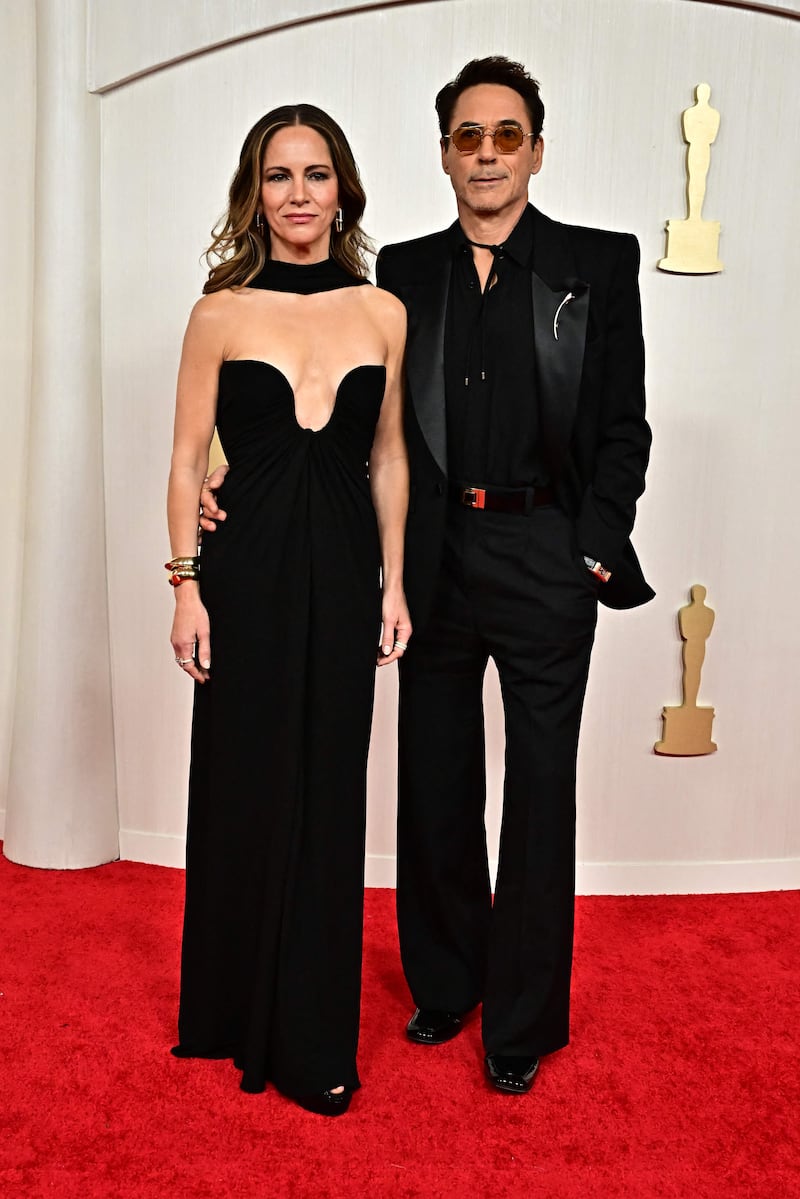 Robert Downey Jr with his wife Susan Downey.  AFP